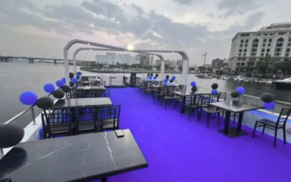 Luxury dinner cruise on a white yacht with a 5-star buffet and New Year’s Eve celebrations in Dubai.