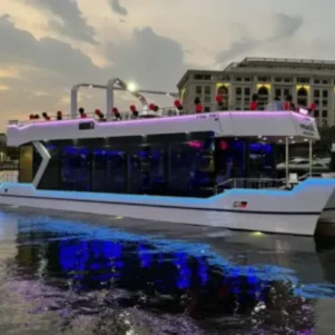 New Year’s Eve party on a premium white yacht with live entertainment, Tanoura dance, and dining in Dubai.