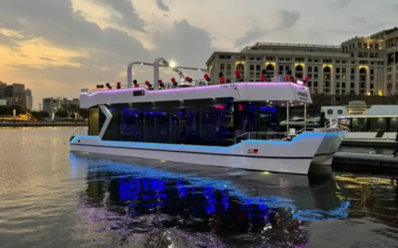 New Year’s Eve party on a premium white yacht with live entertainment, Tanoura dance, and dining in Dubai.